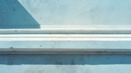 Smooth plaster molding texture on blue wall for architectural designの素材