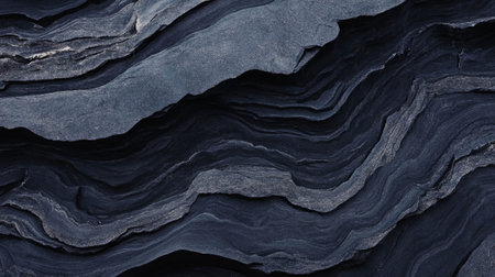 Natural limestone texture with dark grey veins and rough surface for background designの素材