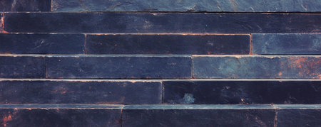 Rustic textured horizontal brick stripes for architectural designの素材