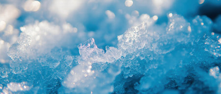 Frozen waterfall sparkling under bright sunlight with ice crystals shimmering beautifully