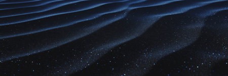 Fine black sand ripples create a unique texture in a tranquil, low-contrast landscapeの素材