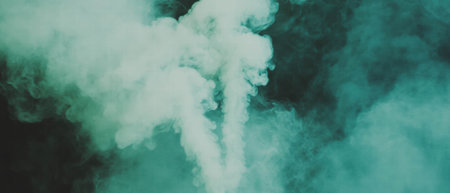 Green smoke rises elegantly, creating a vibrant and natural atmosphere in the airの素材