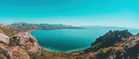 Cinematic view of serene blue sky above a peaceful bay with vibrant landscape