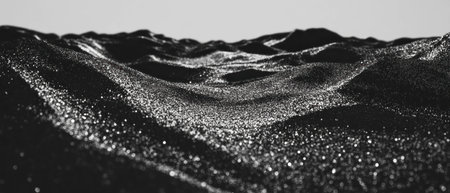 Shimmering silver dust overlay texture creating a dreamlike abstract backgroundの素材