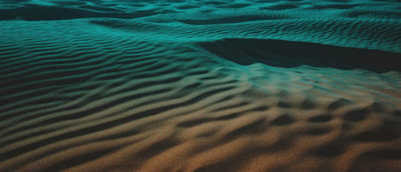 Cinematic view of soft rolling sand dunes with contrasting colors and textures