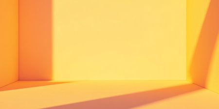 Vibrant yellow space with clean shadows showcasing contrast and depth in minimalist designの素材
