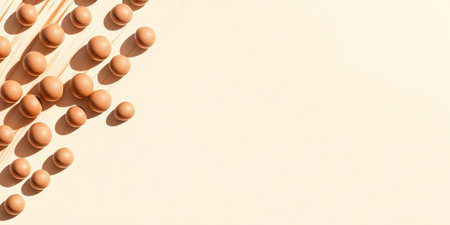 Clay beads create a striking contrast against a clean backdrop highlighting empty space for design...