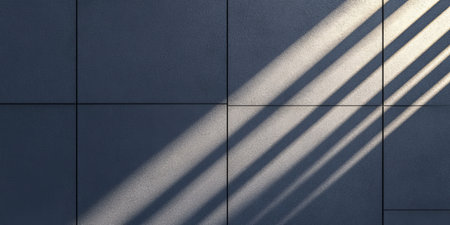 Contrast of Shadows on a Smooth Surface with Rubber Tiles Framing the Edges