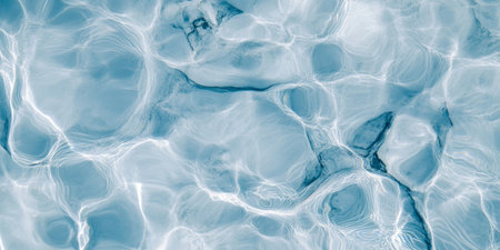 Elevated view of clear blue water with vibrant contrasts and clean shadows in stylish textureの素材