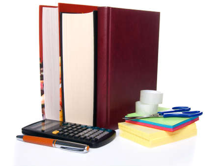school tools: notebook, book, pen, sticky_tape, scissors and calculatorの写真素材
