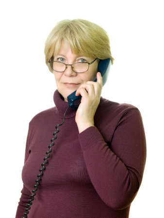 a senior woman at telephone の写真素材