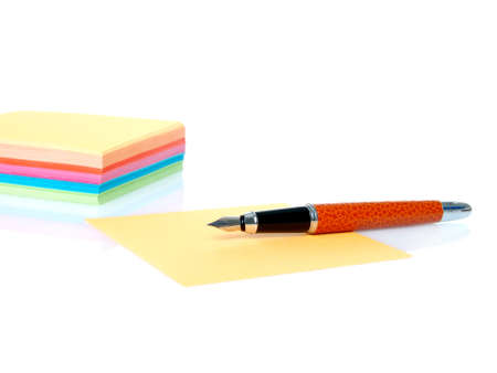 colorful empty notes and pen isolated on a white background 