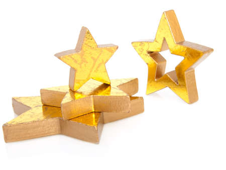 Golden Christmas stars, isolated on white background  の写真素材