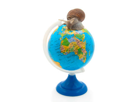 The snail creeps on the globeの写真素材