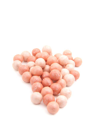 balls of face powder isolated on white backgroundの写真素材