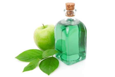 bottle  of  liqueur / alcohol with green appleの写真素材