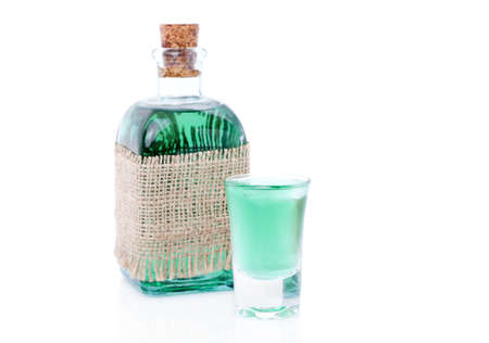 glass of  liqueur / mint drink and bottle の写真素材