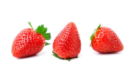 three fresh strawberry, isolated on white background. の写真素材
