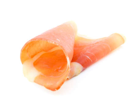 A slice of ham, on white background. の写真素材