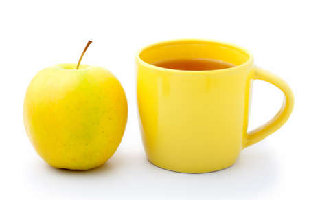 apple with cup of aromatic teaの写真素材