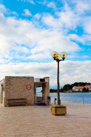 berth with street-lamp on sea background. Pula Croatiaの写真素材
