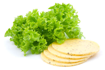 cheese with green salad lettuce, on whiteの写真素材