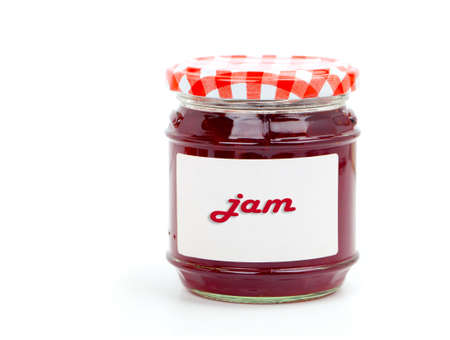 jar with raspberry jam, isolated on white background の写真素材