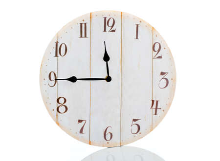 Old wall clock isolated on whiteの写真素材