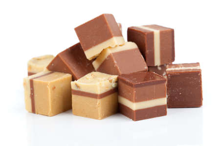 Nougat praline, delicious mix of nougat and almond creme, on white backgroundの写真素材