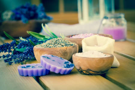 dry Lavender herbs and bath salt on wooden backgroundの写真素材