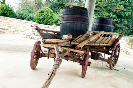 Old cart, standing in the courtyard of the farm の写真素材