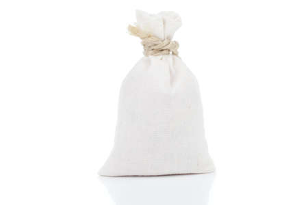Small, white sack, isolated on whiteの写真素材