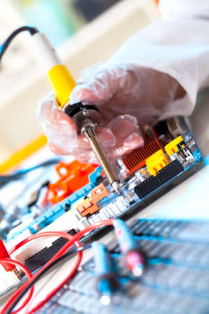 soldering electronic parts on a printed circuit board