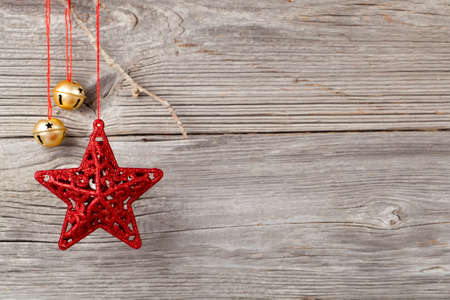 Christmas decoration on wood background, with free space for your textの写真素材
