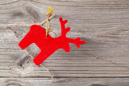 Christmas decoration on wood background, with free space for your textの写真素材