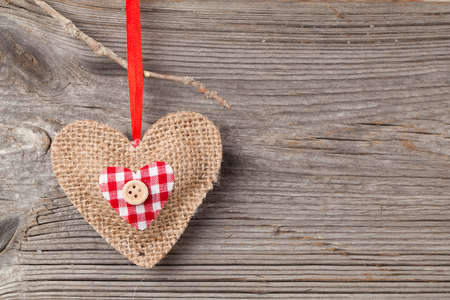 Heart over wooden backgroundの写真素材