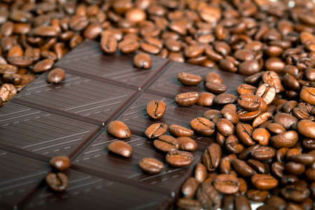 roasted coffee beans with Chocolate, can be used as a backgroundの写真素材