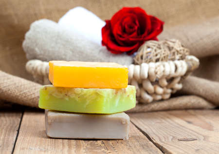 colorful handmade soap bars, on wooden backgroundの写真素材
