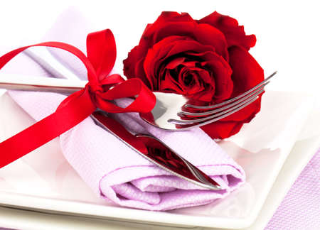 flatware set of fork and knife over plates.の写真素材