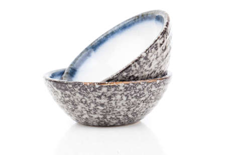 Stack of bowls over whiteの写真素材