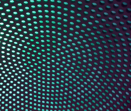 Dotted background of the colorful circles, turquoise geometric pattern. Abstract modern design background. Photo of stained-glass windows in roof.の写真素材