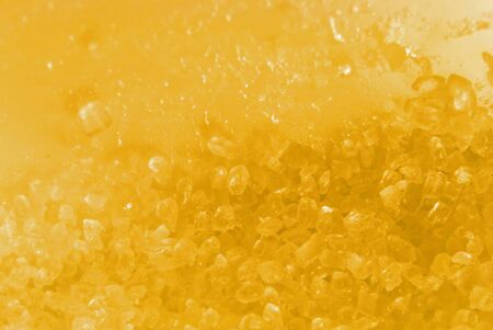 Colorful yellow background with natural crystal texture and soft focused. Vintage and pastel colors.の写真素材