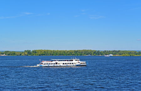 Samara, Russia - august 10, 2017: Tourist motor ship Moskva-110 carries tourists on the Volga river at sunny summer dayのeditorial素材