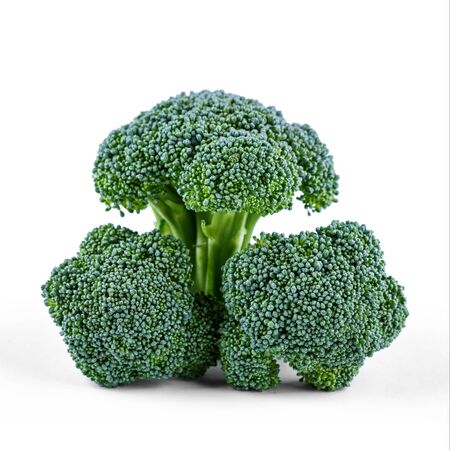 Three green broccoli isolated on white backgroundの写真素材