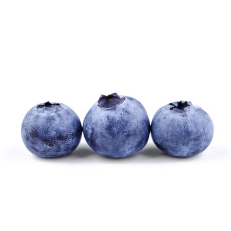 Fresh three blueberries fruit isolated on white with clipping pathの写真素材