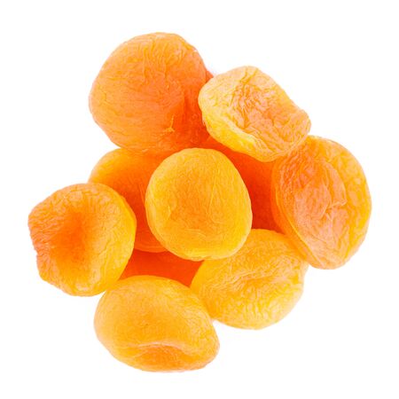 Dried apricot ingredient closeup isolated on a white background. One orange apricot fruit with clipping pathの写真素材