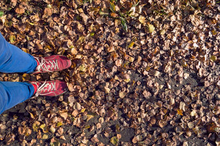 autumn came concep with female in red bootsの写真素材
