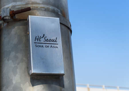 SEOUL, SOUTH KOREA ,SEPTEMBER 13, 2015: Welcoming sign on one of lamp posts of Seoul with clear blue...