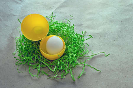 inversed egg white and egg yolk on craft paperの写真素材