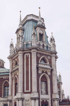 Moscow, Russia, March 11, 2017: one of the towers of main palace in Tsaritsyno Museum-Reserve with grey skies on backgroundのeditorial素材
